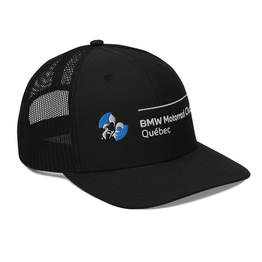 Dark trucker style cap